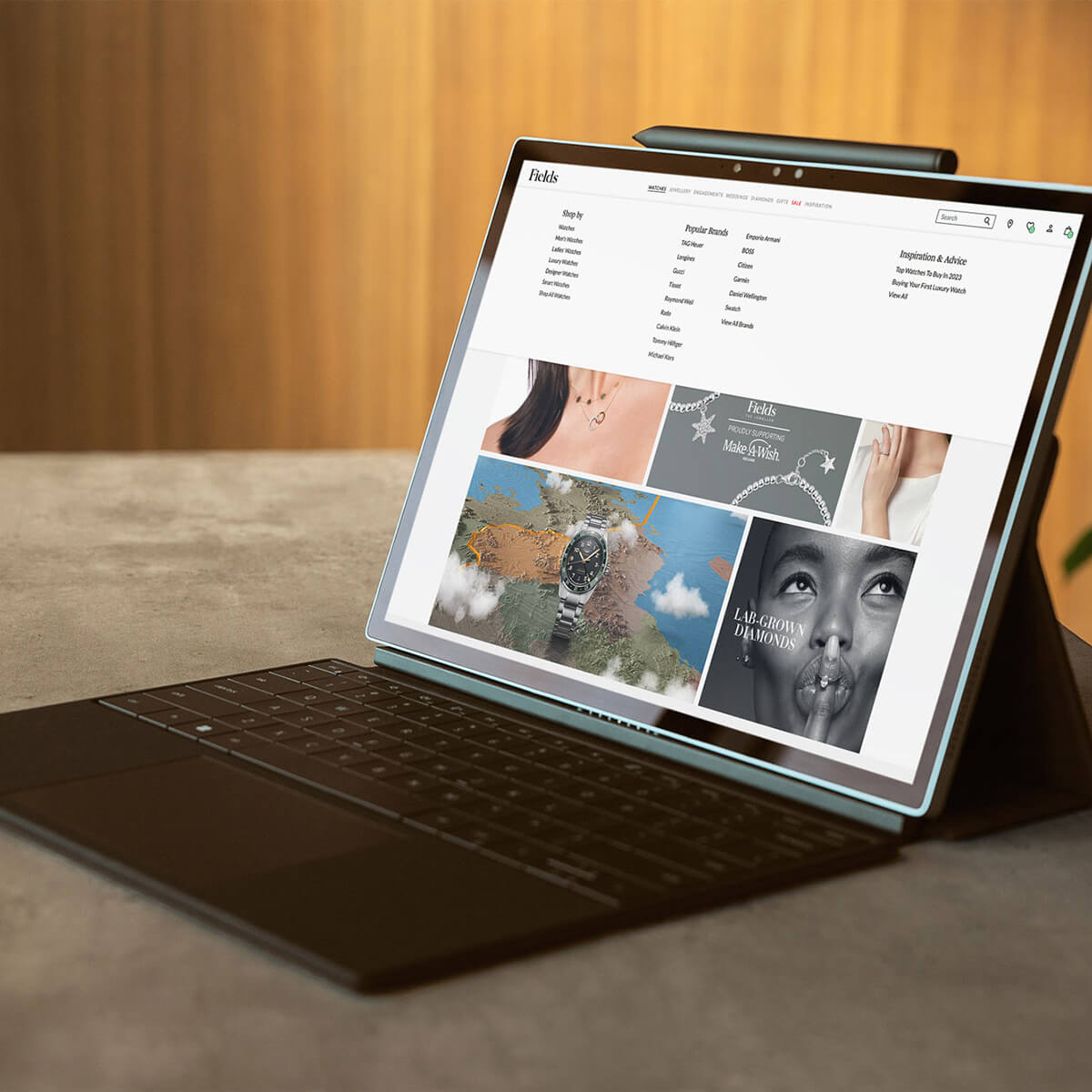 Fields Website on a laptop
